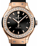 Classic Fusion 38mm in Rose Gold with Diamond Bezel on Black Rubber Strap with Black Dial