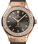 Classic Fusion 38mm in Rose Gold with Diamond Bezel on Grey Rubber Strap with Grey Dial