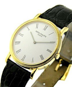 Calatrava in Hobnail Yellow Gold Case With Yellow Gold Bezel on Black Alligator Leather Strap with White Dial