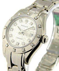 Masterpiece Lady's in White Gold with 12 Diamond Bezel on White Gold Pearlmaster Bracelet with Silver Jubilee Diamond Dial