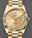 President Day-Date 36mm in Yellow Gold with Fluted Bezel on President Bracelet with Champagne Baguette Diamond Dial