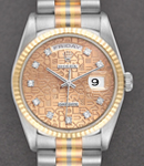 Day Date 36mm in Tridor Gold with Fluted Bezel on Tridor Gold President Bracelet with Champagne Jubilee Diamond Dial