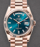 President Day-Date 36mm in Rose Gold with Fluted Bezel on President Bracelet with Blue Baguette Diamond Dial