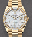 Day Date 36mm in Yellow Gold with Diamond Bezel on Bracelet with MOP Baguette Diamond Dial