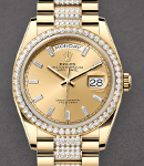 Day Date 36mm in Yellow Gold with Diamond Bezel on President Diamond Bracelet with Champagne Baguette Diamond Dial