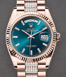 President Day-Date 36mm in Rose Gold with Fluted Bezel on President Diamond Bracelet with Blue Baguette Diamond Dial