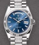 President Day-Date 36mm in White Gold with Fluted Bezel on President Diamond Bracelet with Blue Baguette Diamond Dial