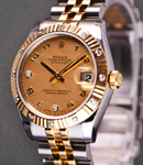 Datejust 31mm 2-Tone with Partial Diamond Bezel on Jubilee Bracelet with Champagne MOP Arabic Dial - Diamonds on 6 and 9