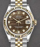 Mid Size Datejust 31mm in Steel with Yellow Gold Fluted Bezel on Jubilee Braclet with Black MOP Diamond Dial