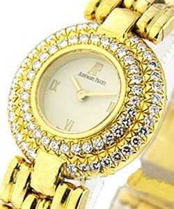 Round 22mm in Yellow Gold with Diamonds Bezel on YG Bracelet with Ivory Dial