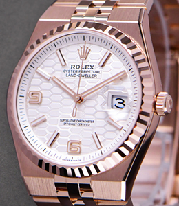 Land Dweller 36mm in Rose Gold with Fluted Bezel on Rose Gold Jubilee Bracelet with White Honeycomb Index Dial