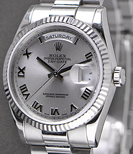 President 36mm in White Gold with Fluted Bezel on President Bracelet with Flat Buckle - Rhodium Roman Dial