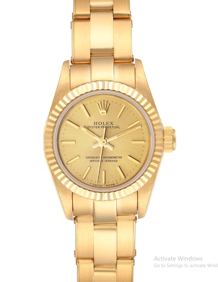 Oyster Perpetual No Date Lady's in Yellow Gold with Fluted Bezel on Oyster Bracelet with Champagne Stick Dial