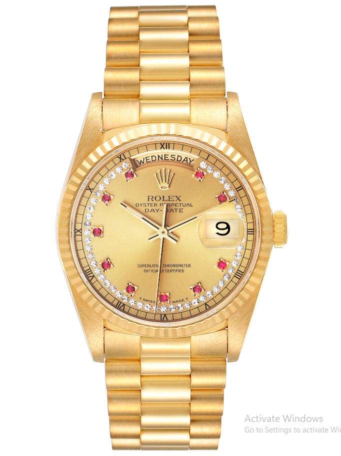 President 36mm Day Date in Yellow Gold with Fluted Bezel on President Bracelet with Champagne Ruby Diamond Dial