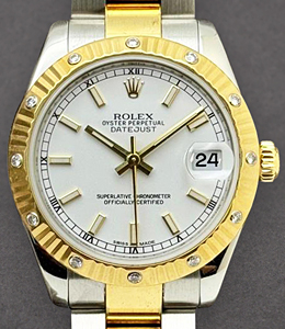 Datejust 31mm in Steel with Yellow Gold 12 Diamond Bezel on Oyster Bracelet with White Stick Dial
