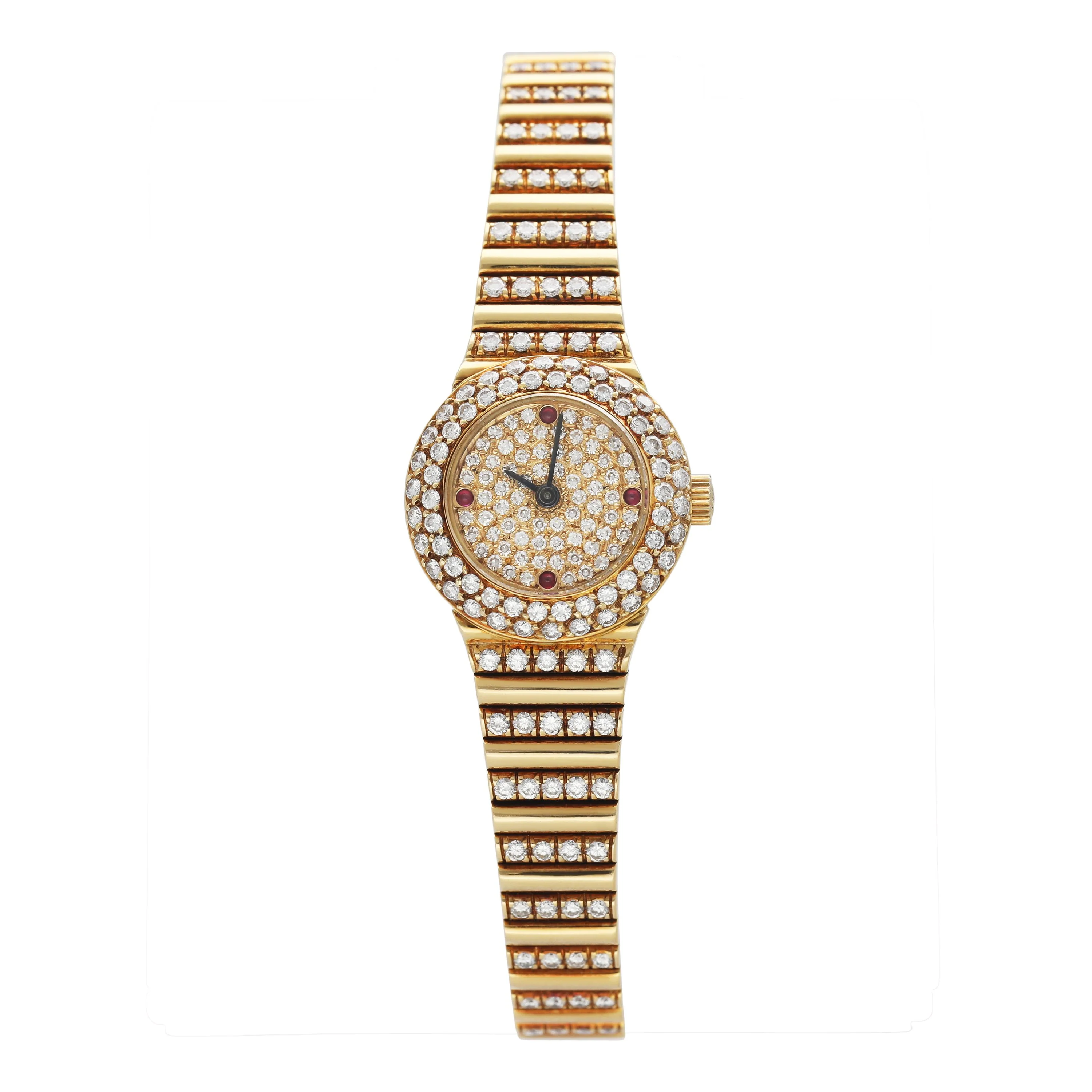 Patek Philippe Vintage Lady's Cocktail Watch with Pave Diamon and Ruby Dial On Yellow Gold Pave Diamond Bracelet
