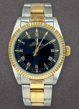 Pre-Owned Rolex 67513 Oyster Perpetual No Date 31mm in Steel with Yellow Gold Fluted Bezel 67513