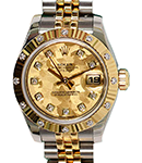 Datejust Lady's in Steel with Yellow Gold Fluted 12 Diamond Bezel on Jubilee Bracelet with Champagne Crystal Diamond Dial