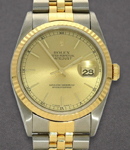 Datejust 36mm in Steel with Yellow Gold Fluted Bezel on Jubilee Bracelet with Champagne Stick Dial