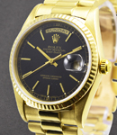 Day-Date 36mm in Yellow Gold with Fluted Bezel on Bracelet with Black Stick Dial