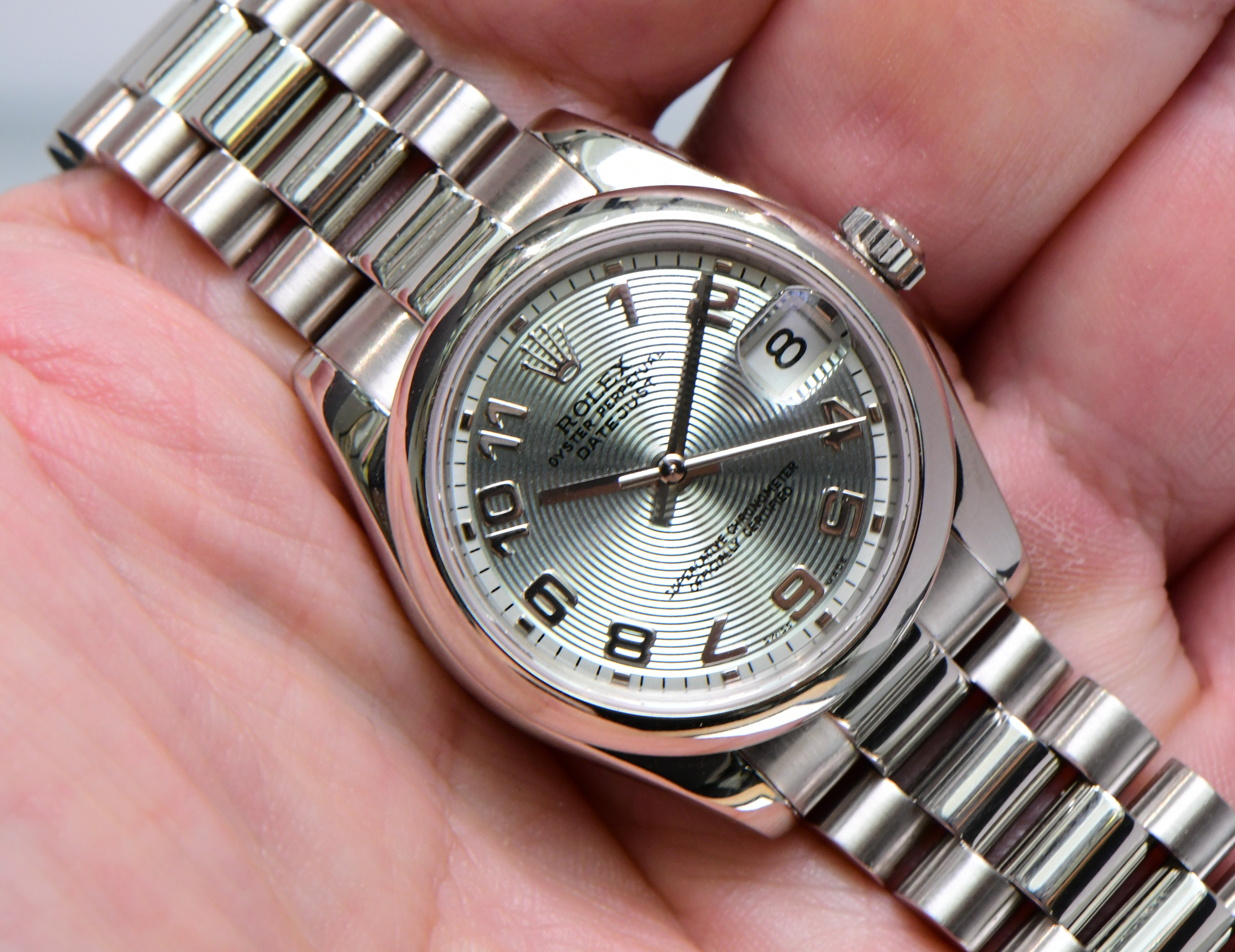 Pre-Owned Rolex Midsize Platinum President with Glacier Blue Concentric Arabic Dial