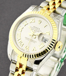 Datejust 26mm in Steel with Yellow Gold Fluted Bezel on Bracelet with Silver Sunbeam Roman Dial 