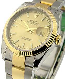 Datejust 36mm in Steel with Yellow Gold Fluted Bezel on Oyster Bracelet with Champagne Stick Dial
