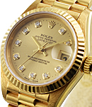 President in Yellow Gold with Fluted Bezel on Yellow Gold President Bracelet with Champagne Diamond Dial