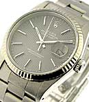 Men's Datejust 36mm in Steel with White Gold Fluted Bezel on Oyster Bracelet with Black Tapestry Stick Dial