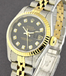 Datejust Lady's in Steel and Yellow Gold Fluted Bezel on Steel and Yellow Gold Jubilee Bracelet with Black Diamond Dial