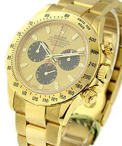 Daytona in Yellow Gold on Yellow Gold Oyster Bracelet with Champagne Dial with Black Sub Dials
