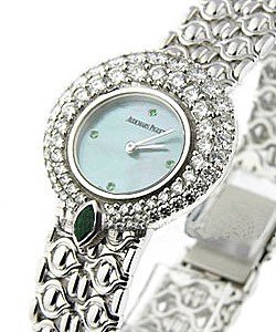 Round Case - Boutique Item in White Gold with Diamonds Bezel  on WG Bracelet with Blue MOP Dial