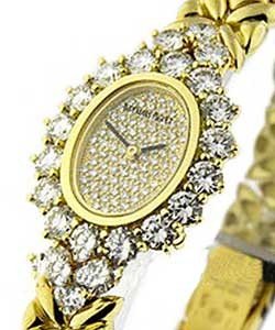 Oval - Boutique Item in Yellow Gold with Diamonds Bezel Yellow Gold on Bracelet with Pave Diamonds Dial