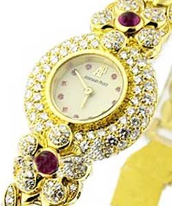 Round - Boutique Item in Yellow Gold with Diamonds Bezel on Yellow Gold Diamond Bracelet with Silver Dial