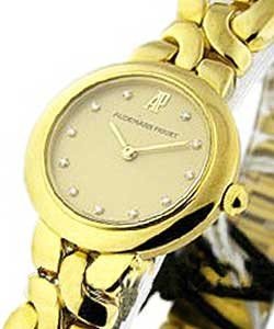 Lady's Round in Yellow Gold on Yellow Gold Bracelet with Champagne Diamond Dial