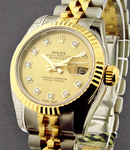 Ladies 26mm Datejust in Steel with Yellow Gold Fluted Bezel on Steel and Yellow Gold Jubilee Bracelet with Champagne Diamond Dial