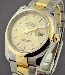 Datejust 36mm in Steel with Yellow Gold Smooth Bezel on Steel and Yellow Gold Oyster Bracelet with Champagne Stick Dial