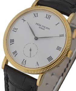 Calatrava 33mm in Yellow Gold on Black Alligator Leather Strap with White Roman Dial
