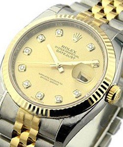 Datejust 36mm in Steel with Yellow Gold Fluted Bezel on Jubilee Bracelet with Champagne Diamond Dial