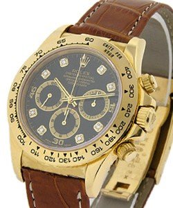 Daytona in Yellow Gold on Strap with Factory Black Diamond Dial