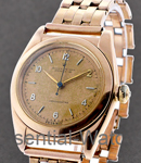 1950's 14KT Bubble Back in Rose Gold on Rose Gold Bracelet with Pattina Dial