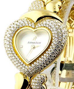 Heart Shaped in Yellow Gold with Diamond Bezel on Yellow Gold Diamond Bracelet in MOP Diamond Dial