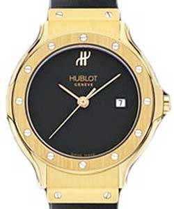 Classic Quartz 28m in Yellow Gold on Black Rubber Strap with Black Dial