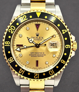 GMT-Master in Steel and Yellow Gold with Black Bezel on Oyster Bracelet with Champagne Serti Diamond and Ruby Dial