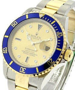 Submariner 40mm in Steel with Yellow Gold Blue Bezel on Oyster Bracelet with Champagne Serti Diamond Dial