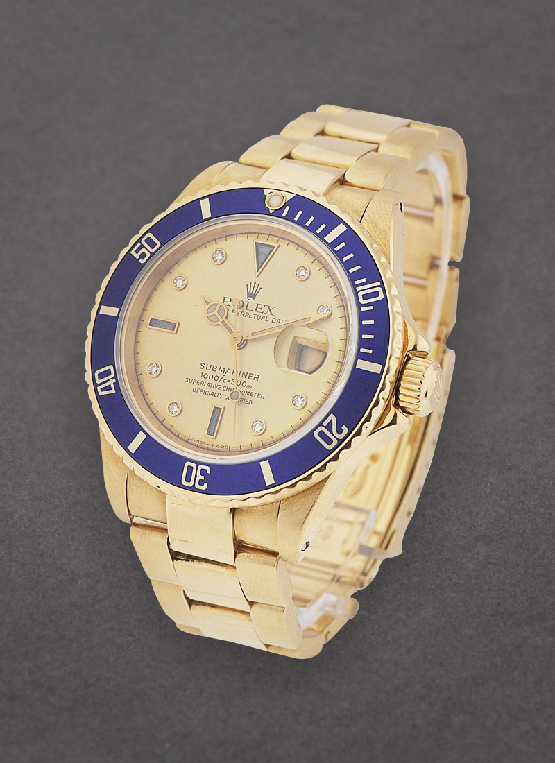 Pre-Owned Rolex Submariner in Yellow Gold with Blue Bezel