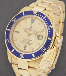 Submariner in Yellow Gold with Blue Bezel on Oyster Bracelet with Champagne Diamond Dial