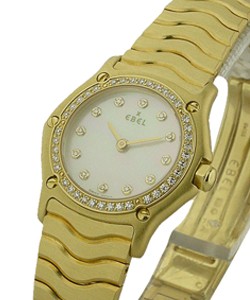 Classic Wave with Diamond Bezel   Yellow Gold on Bracelet with MOP Dial