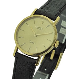 Cellini Classic - 25mm - Yellow Gold on Black Strap with Champagne stick Dial