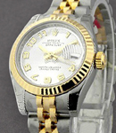 Datejust Ladies 26mm in Steel with Yellow Gold Fluted Bezel on Jubilee Bracelet with Silver Concentric Dial - Arabic Numerals